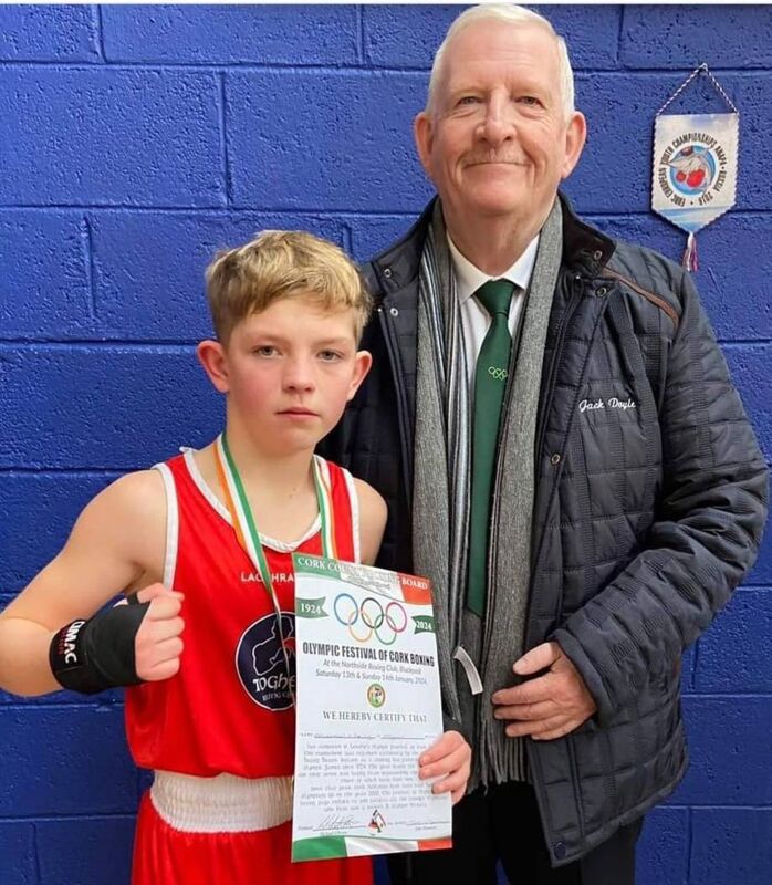 Cork Boxing: Michael O'Brien with Michael O'Reilly, Togher BC, with his cert and medal at the Olympic Boxing Tournament. 