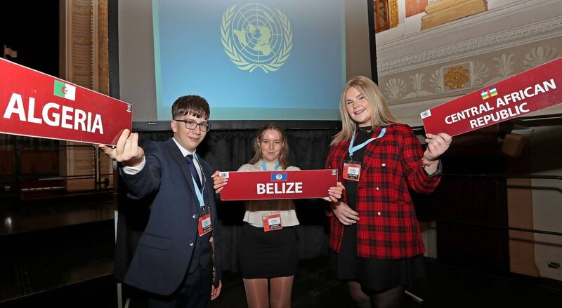 Liam Healy, Leah Harold and Aine O'Rourke, all Davis College students, at Day One of the 2024 Model United Nations, hosted by Davis College Mallow, at City Hall, Cork. Picture: Jim Coughlan.