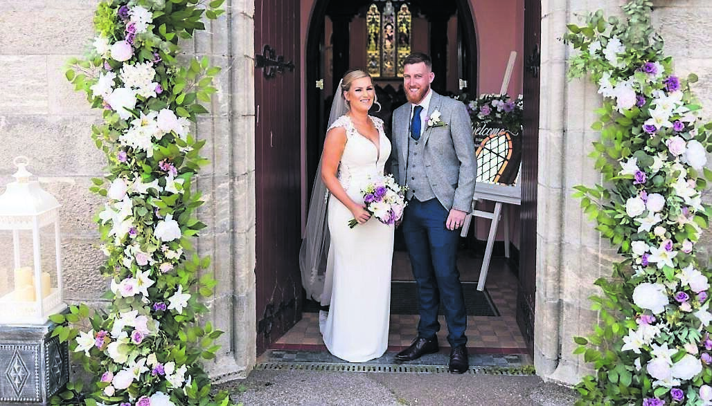 Samantha Crean and Denis Sheehan outside the church on their big day - they both grew up as close neighbours in Cloughduv