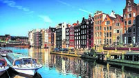 Typical Dutch Houses and Canal in the Center of Amsterdam