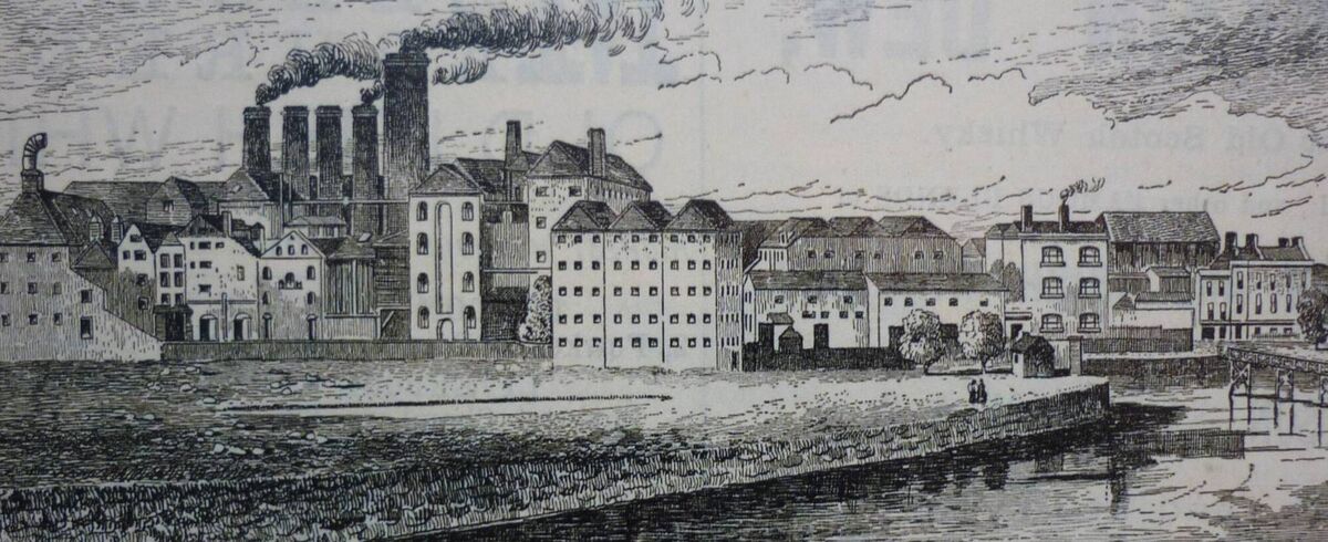 An artist’s impression of the North Mall (Wise’s) Distillery in the 19th century from Grenville Place. This distillery was established in 1779 by the Wise brothers, William and Thomas. In 1887, with a workforce of almost three hundred, the Distillery complex covered an area of twenty-three acres and distilled a brand called: “Wise’s Old Pot Still Whiskey”. In 1920, following a fire which destroyed a large section of the complex, it ceased its whiskey production after which the Distillery was converted into a bottling and store facility which operated until 2007. Three years later, much of the site was redeveloped and became the home of UCC's North Mall Campus. Notice on the right is a wooden bridge this was erected in 1862 and in 1875 it was replaced by the present St. Vincent’s Bridge. Picture: Cork Distilleries Company Annuals/Cork City Library 