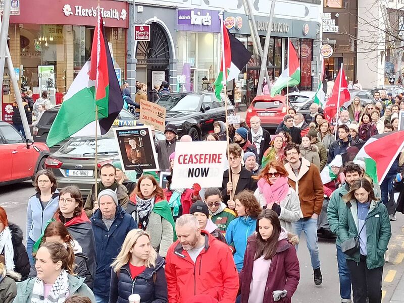 Health workers lead chants as 1,000 people march for Palestine in Cork for 16th Saturday in a row.