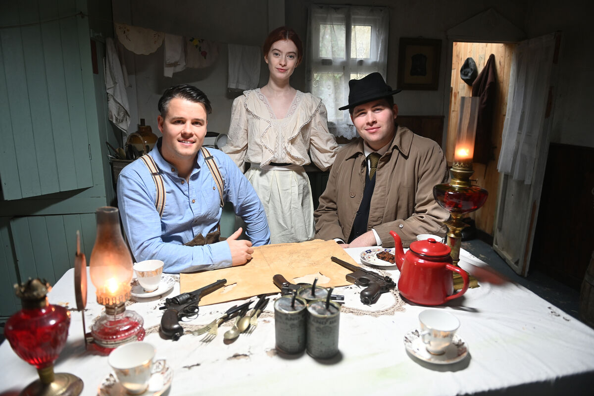 Actors on set in the kitchen at 'The Laurels' on Pouladuff Road. Dayl Cronin, Abigail O'Regan (great granddaughter of John Joe Hegarty) and Shane Downey at the kitchen table. Picture: Larry Cummins.
