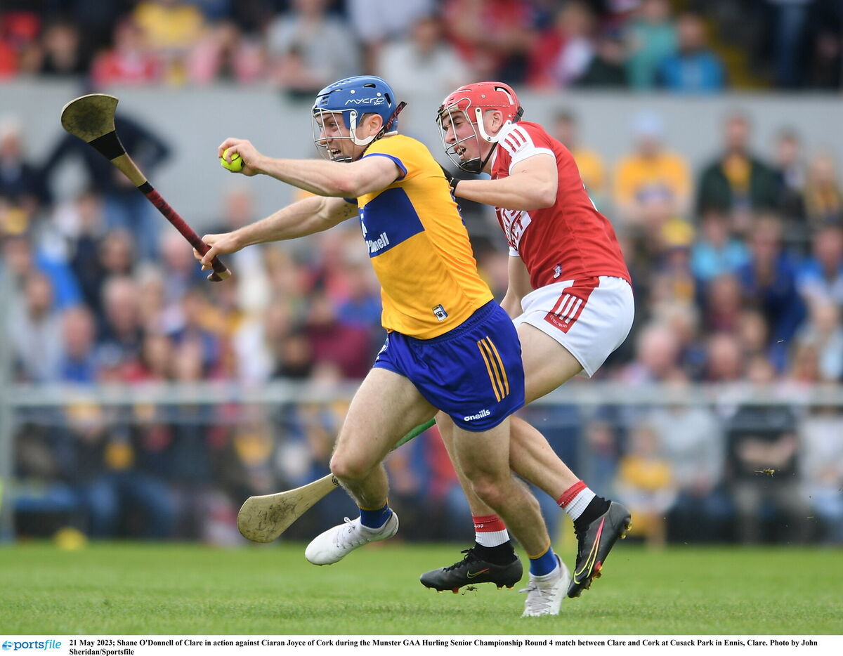Shane O'Donnell of Clare in action against Ciarán Joyce of Cork last summer in Ennis. Picture: John Sheridan/Sportsfile Shane O'Donnell of Clare in action against Ciarán Joyce of Cork last summer in Ennis. Picture: John Sheridan/Sportsfile