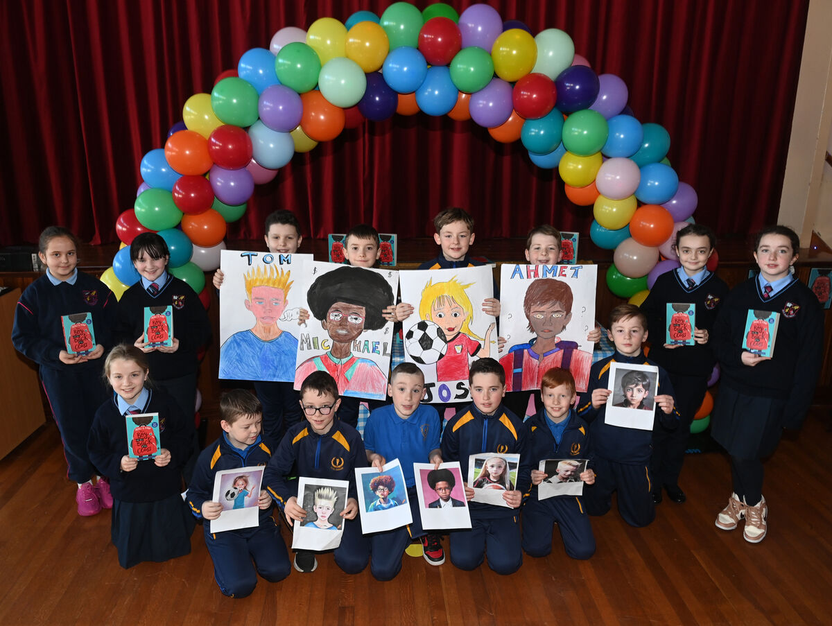 Pupils from Scoil Aiséirí Chríost and Scoil Íosagáin with artwork created based on the book characters at the launch of the One Book One Community project with the book 'The Boy at the Back of the Class'. Pic Larry Cummins Pupils from Scoil Aiséirí Chríost and Scoil Íosagáin with artwork created based on the book characters at the launch of the One Book One Community project with the book 'The Boy at the Back of the Class'. Pic Larry Cummins