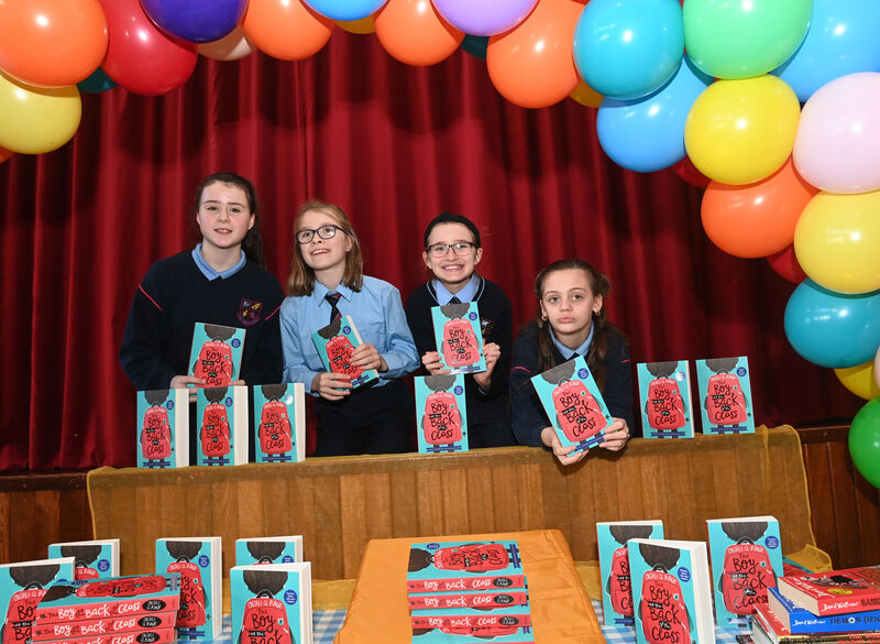Pupils Lexie O'Connell, Lucy Gardiner, Emily O'Mahony and Shyanne Hourigan at ,Scoil Aiséirí Chríost, for the launch of the One Book One Community project with the book 'The Boy at the Back of the Class'. Pic Larry Cummins Pupils Lexie O'Connell, Lucy Gardiner, Emily O'Mahony and Shyanne Hourigan at ,Scoil Aiséirí Chríost, for the launch of the One Book One Community project with the book 'The Boy at the Back of the Class'. Pic Larry Cummins