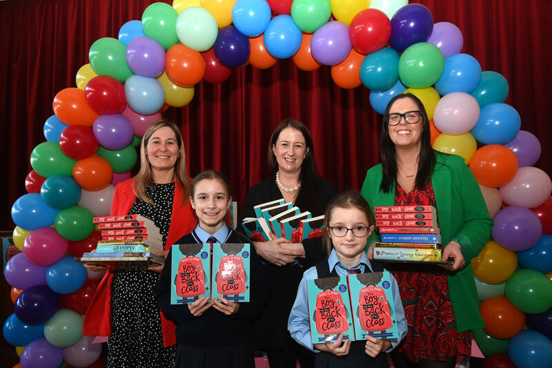Pupils Lana and Rhia with (rear) home school coordinators Ingrid O'Shea, Nano Nagle College, Tara O'Sullivan, Scoil Aiséirí Chríost, and Eibhlis Moynihan, Scoil Íosagáin at the launch of the One Book One Community project with the book 'The Boy at the Back of the Class'. Pic Larry Cummins Pupils Lana and Rhia with (rear) home school coordinators Ingrid O'Shea, Nano Nagle College, Tara O'Sullivan, Scoil Aiséirí Chríost, and Eibhlis Moynihan, Scoil Íosagáin at the launch of the One Book One Community project with the book 'The Boy at the Back of the Class'. Pic Larry Cummins
