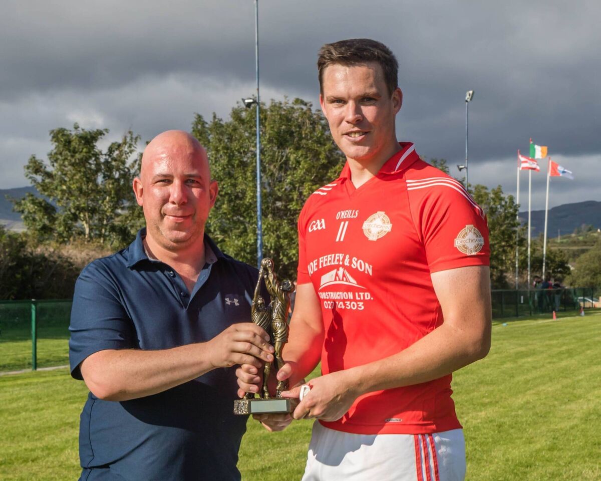 Cork's Munster Council delegate Joseph Blake (left), presenting the Glenview Heating Man of the Match Award to Urhan's Martin McCarthy after the 2019 Beara JAFC final. Picture: Anne Marie Cronin