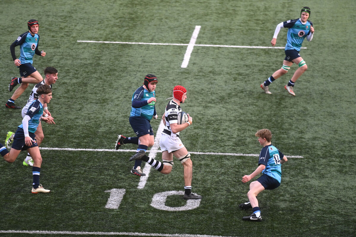 Conor McLoughlin makes a break to set up a try for Presentation Brothers College, Cork against Castletroy College at Virgin Media Park in the School Junior Cup. Picture: Larry Cummins