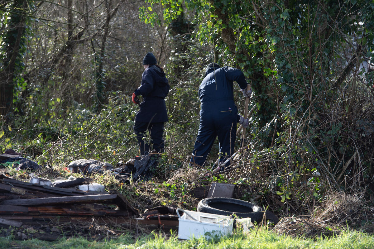  A Garda team searching the undergrowth at Whitewell Cross on the main Midleton to Whitegate near where skeletal remains were discovered while searching for missing man Kieran Quilligan. Picture Dan Linehan