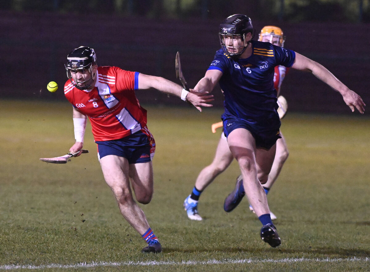 MTU Cork's Sam Quirke gathers the ball from DCU's C Padraig Moylan during the Fitzgibbon Cup at MTU. Picture: Eddie O'Hare