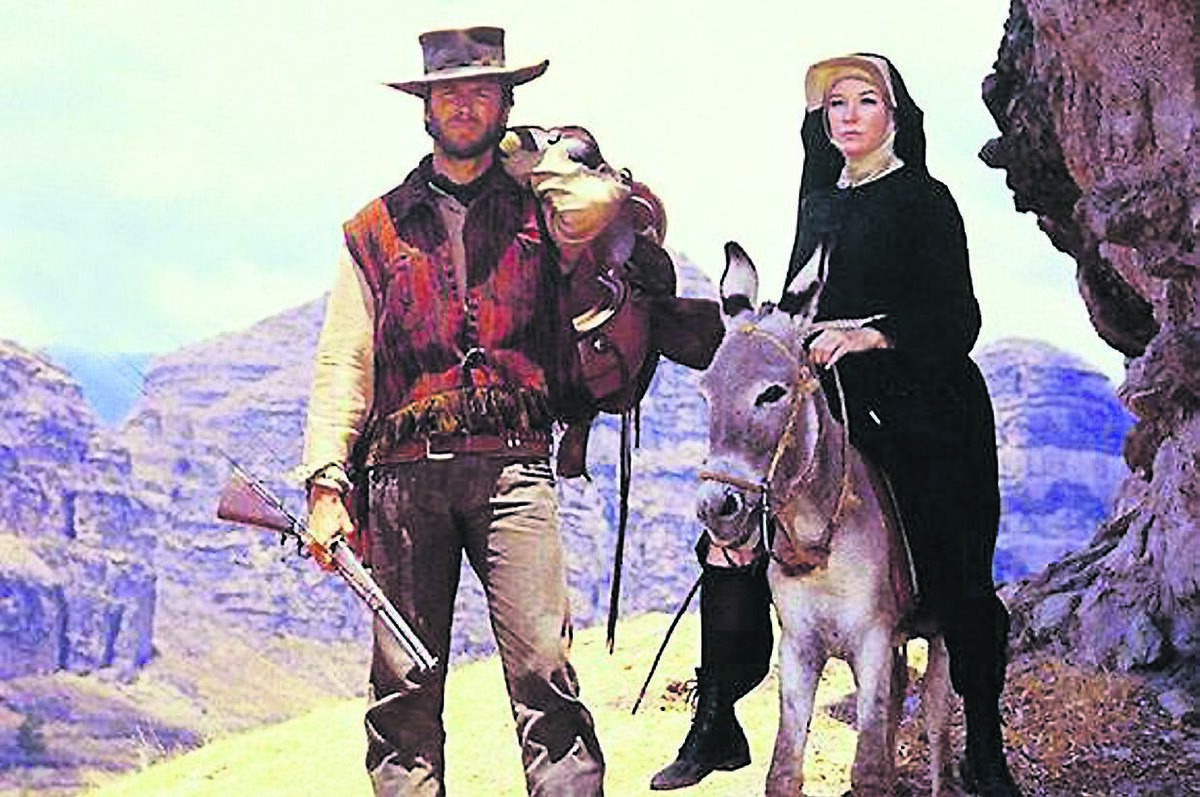 Clint Eastwood and Shirley MacLaine in Two Mules For Sister Sara. Clint Eastwood and Shirley MacLaine in Two Mules For Sister Sara.