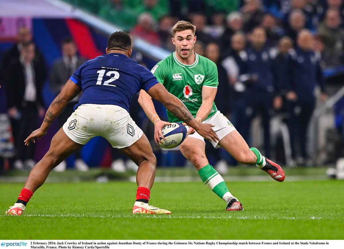 Jack Crowley of Ireland in action against Jonathan Danty of France. Picture: Ramsey Cardy/Sportsfile Jack Crowley of Ireland in action against Jonathan Danty of France. Picture: Ramsey Cardy/Sportsfile
