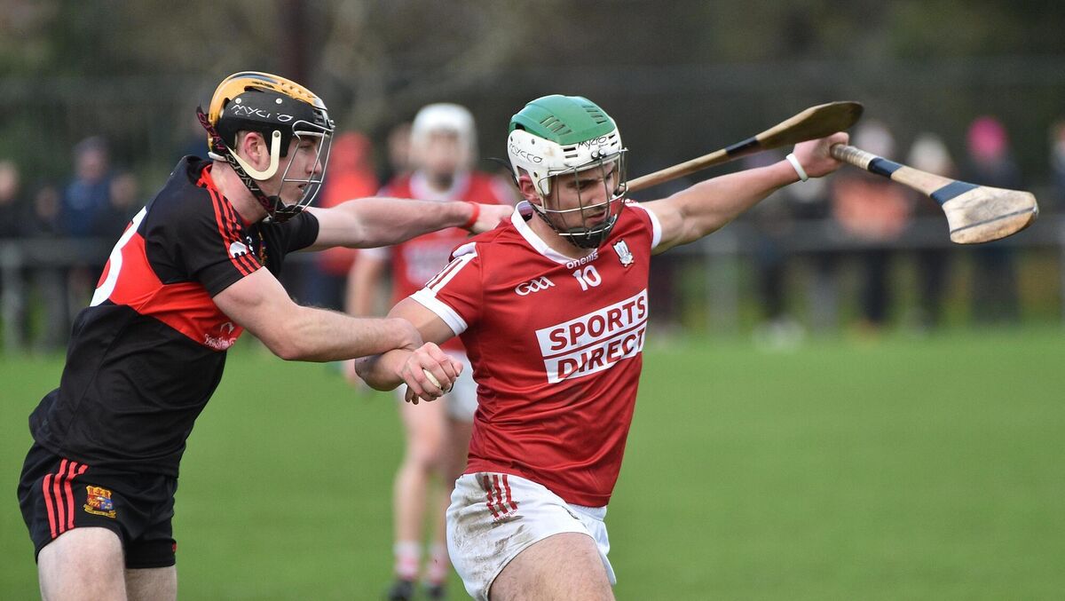 Daniel Hogan, UCC getting in a tackle on Shane Kingston, Cork during the annual Canon O'Brien Cup match at the Mardyke, Cork. Picture Dan Linehan