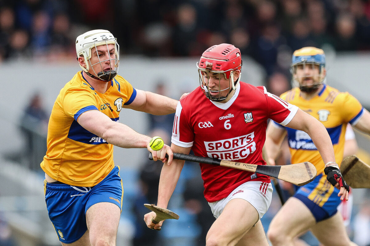 Ciarán Joyce of Cork in action against Conor Cleary of Clare. Picture: INPHO/Natasha Barton