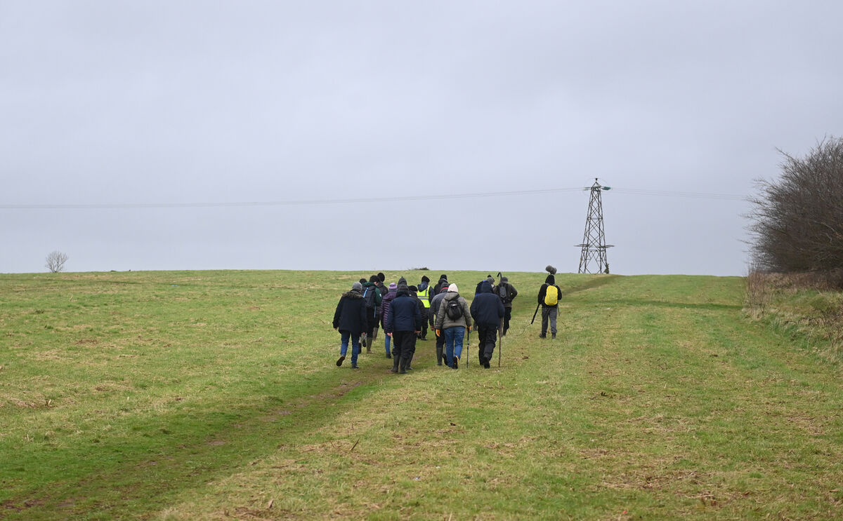 The group setting off on a nature walk of Murphy's Rock. Pic Larry Cummins