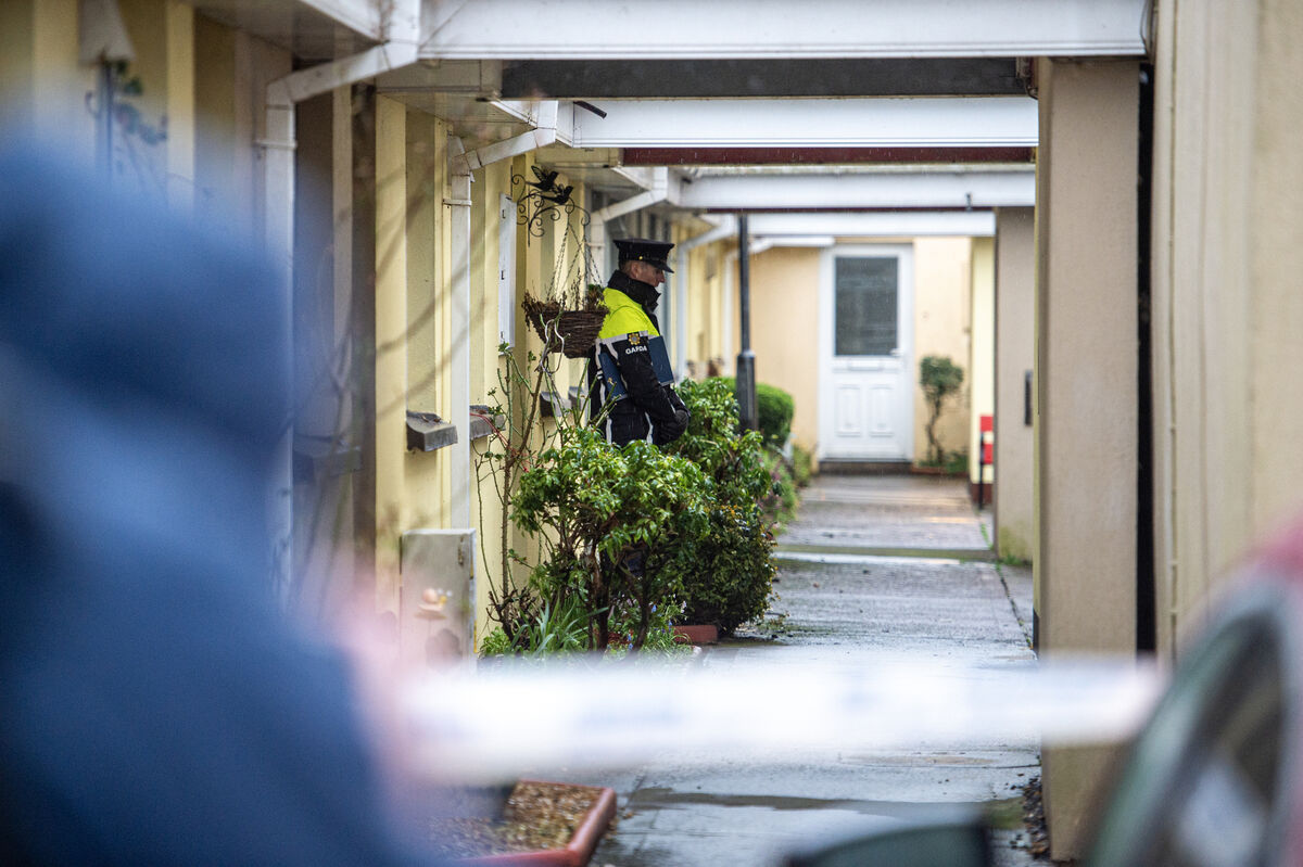 A Garda on duty at Annville, Barrett's Place, Macroom where the body of a man was discovered. Picture Dan Linehan A Garda on duty at Annville, Barrett's Place, Macroom where the body of a man was discovered. Picture Dan Linehan