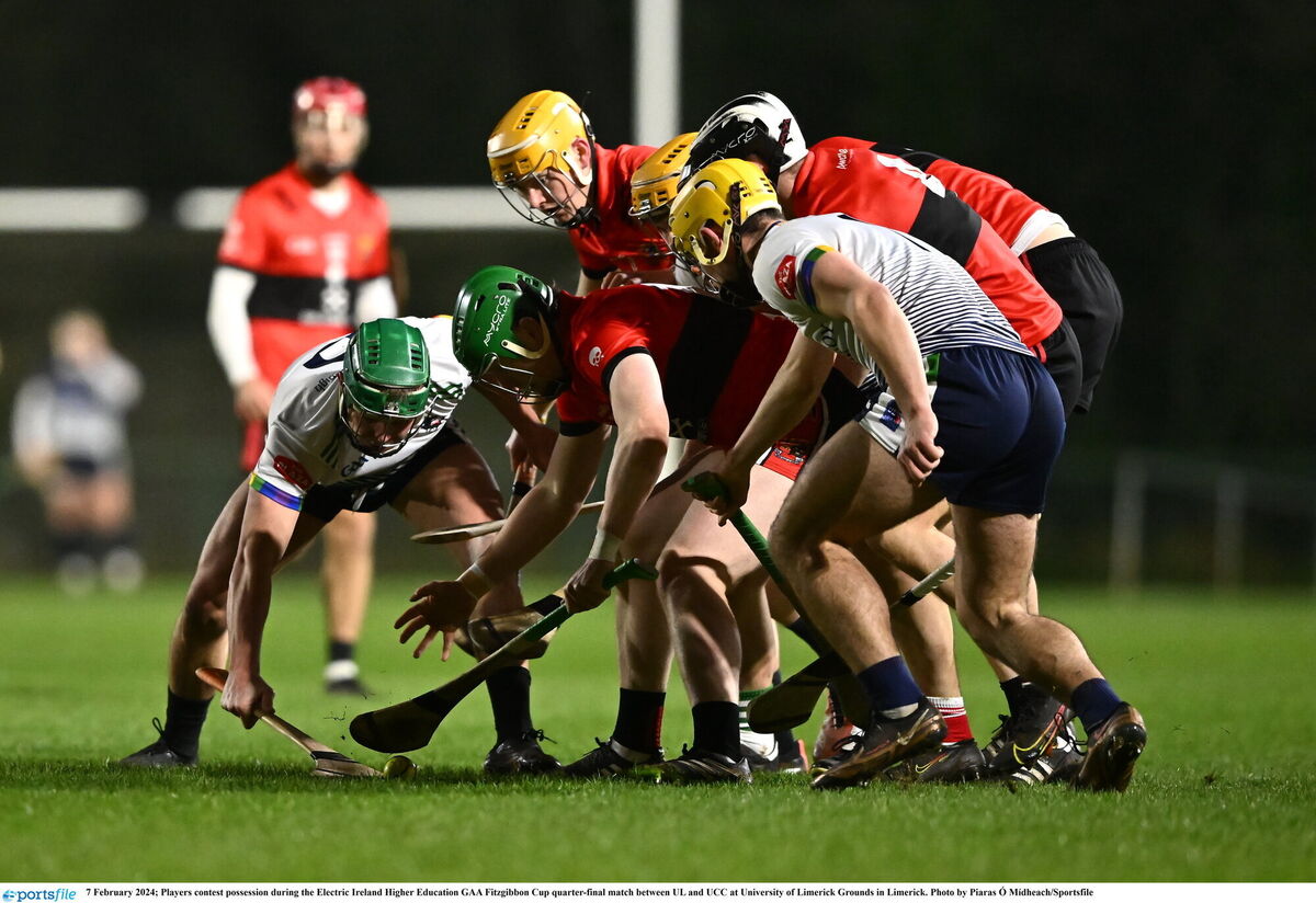 Players contest possession during the Electric Ireland Higher Education GAA Fitzgibbon Cup quarter-final match between UL and UCC at University of Limerick Grounds in Limerick. Photo by Piaras Ó Mídheach/Sportsfile