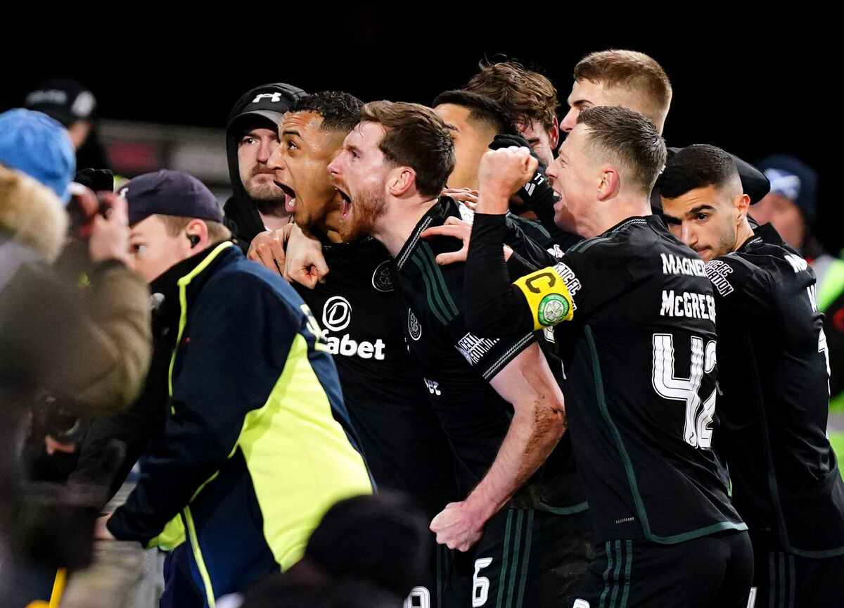 Celtic's Adam Idah (left) celebrates after scoring their side's winner. Picture: Jane Barlow/PA Wire.