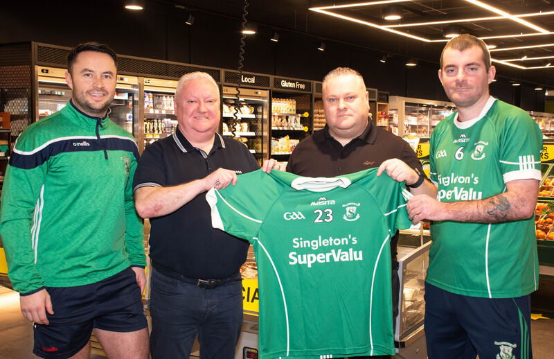 Tomas Singleton, owner and Adrian Singleton, Manager Singleton's Super Valu Hollyhill pictured presenting a set of sponsorship jerseys to Darren O'Regan and Ian O'Connor of St Vincents Hutrling and Football Club in Hollyhill recently. Picture: Howard Crowdy