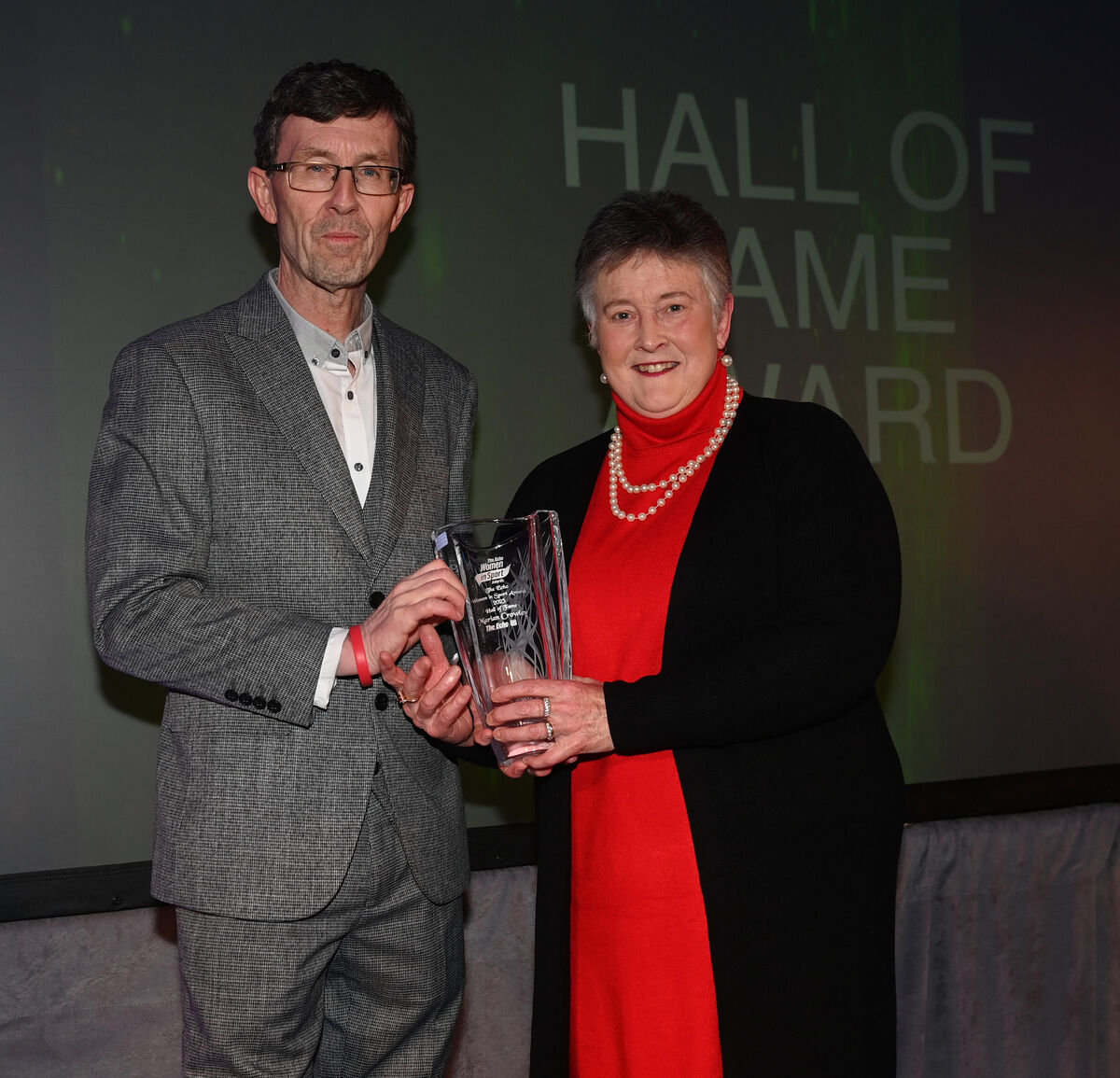 Rory Noonan, The Echo, presents Marian Crowley, with the Hall of Fame award. Picture; Eddie O'Hare