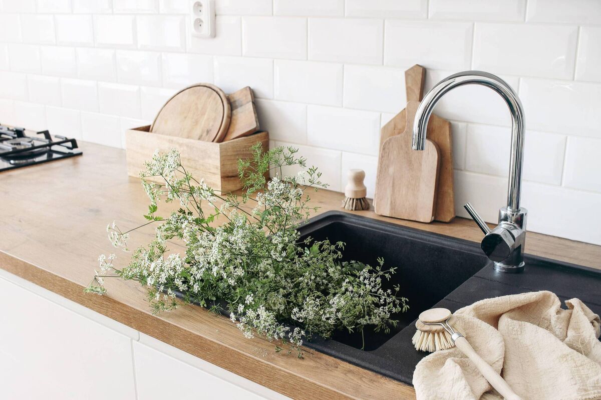 Once a day spray and wipe down countertops and the stovetop with a multi-purpose cleaner; and scrub and disinfect your sink and backsplash. Once a day spray and wipe down countertops and the stovetop with a multi-purpose cleaner; and scrub and disinfect your sink and backsplash.