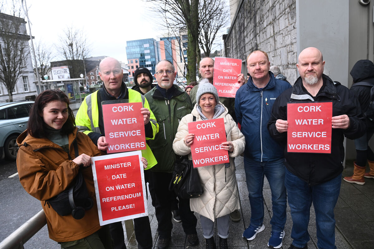 A protest took place this afternoon outside Uisce Éireann’s offices on Eglinton St over ongoing water quality issues in Cork city. Pictured are Mick Barry, TD with Cllrs Brian McCarthy and Mick Nugent and water service workers at the protest. Picture: Larry Cummins A protest took place this afternoon outside Uisce Éireann’s offices on Eglinton St over ongoing water quality issues in Cork city. Pictured are Mick Barry, TD with Cllrs Brian McCarthy and Mick Nugent and water service workers at the protest. Picture: Larry Cummins