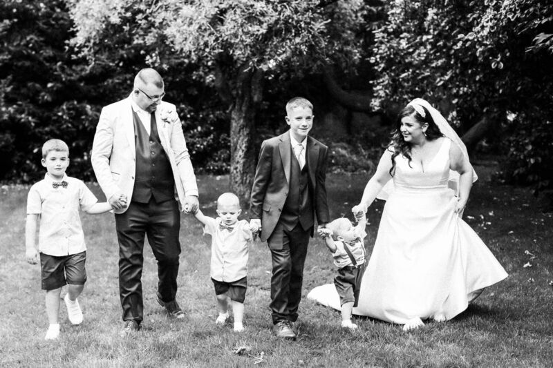 The couple with sons, Kian, Mason, Dillon and Tommy, on their wedding day. The couple with sons, Kian, Mason, Dillon and Tommy, on their wedding day.