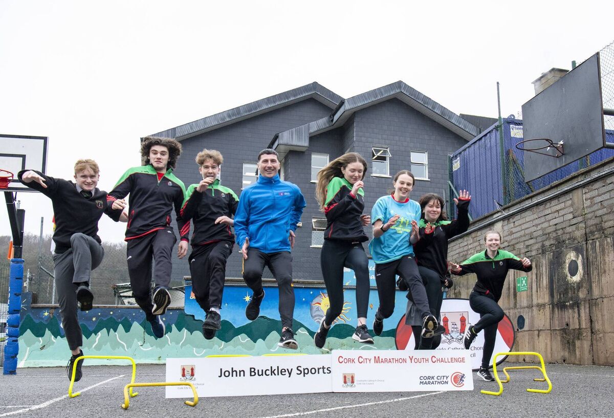 Pictured at the launch of the launch of the Cork City Marathon John Buckley Sports 2024 Youth Challenge in Coláiste an Phiarsaigh Secondary School in Glanmire were, Ronán Ó Mathúna, Seán Ó Gógáin, Gavin Ó Mathúna, Abbey Pyne, Emily Ní Eathrín, Aine O'Mara, Meabh Watkins and Molly Ní Chlúmháin along with Chris Harrington, Youth Challenge co-ordinator.  Pic: Brian Lougheed