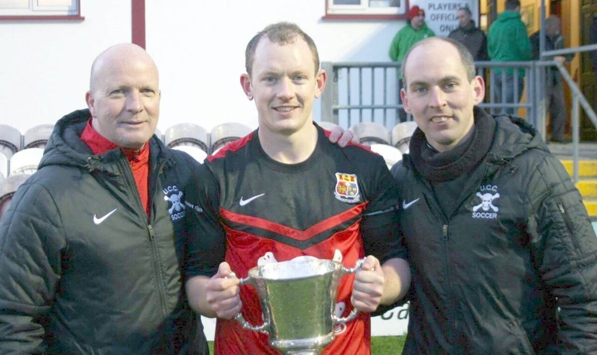 UCC manager Noel Healy, captain Cian Hill and Coach Conor Uhl with the 2015 Collingwood Cup won by the Cork University.