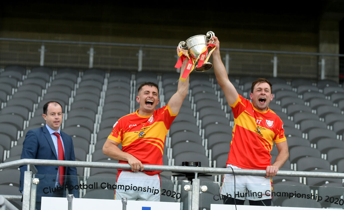 Éire Óg joint captains Kevin Hallissey and John Kelleher raise the Paddy Walsh Cup after beating Aghabullogue in the 2020 Co-op SuperStores IAHC final, played in August 2021. Picture: Larry Cummins