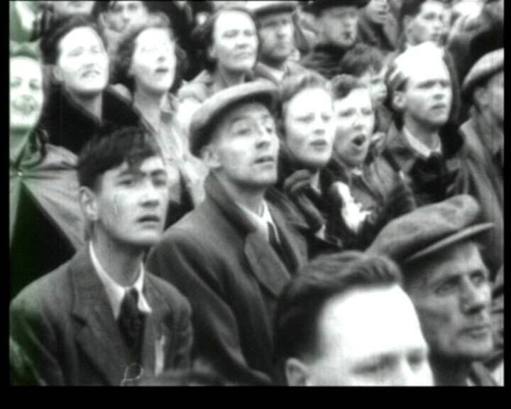 A crowd scene from the 1955 short film Three Kisses A crowd scene from the 1955 short film Three Kisses