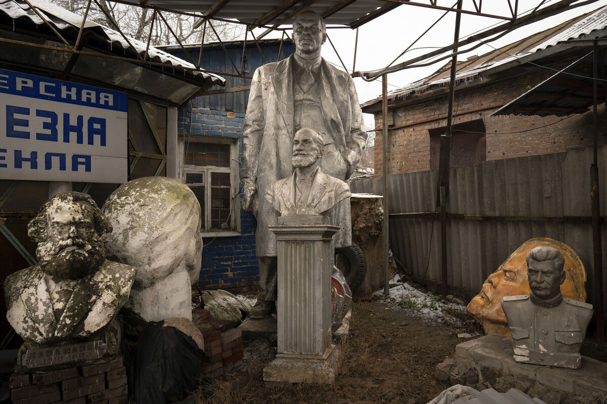 Soviet-era statues are discarded outside a glass workshop in Kharkiv, Ukraine, Tuesday, Feb. 28, 2023. (AP Photo/Vadim Ghirda)