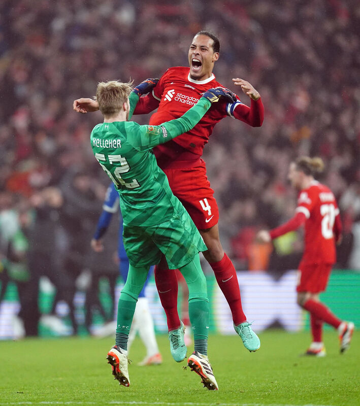 Liverpool goalkeeper Caoimhin Kelleher and Virgil van Dijk celebrate after the final whistle of the Carabao Cup final at Wembley Stadium, London. Liverpool goalkeeper Caoimhin Kelleher and Virgil van Dijk celebrate after the final whistle of the Carabao Cup final at Wembley Stadium, London.