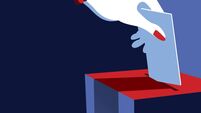 Business Woman Voting at the Ballot Box