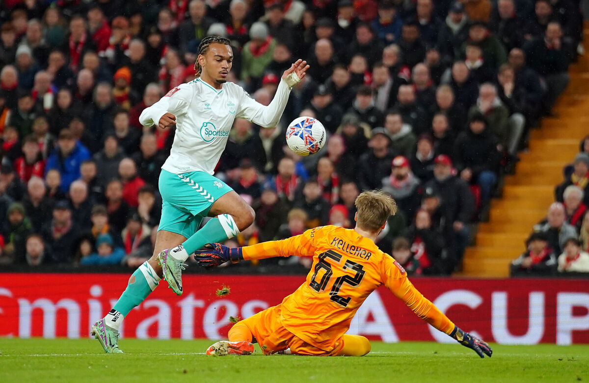 Liverpool goalkeeper Caoimhin Kelleher saves from Southampton's Sekou Mara during the Emirates FA Cup fifth round match at Anfield, Liverpool. Liverpool goalkeeper Caoimhin Kelleher saves from Southampton's Sekou Mara during the Emirates FA Cup fifth round match at Anfield, Liverpool.