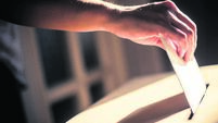 Conceptual image of a person voting during elections