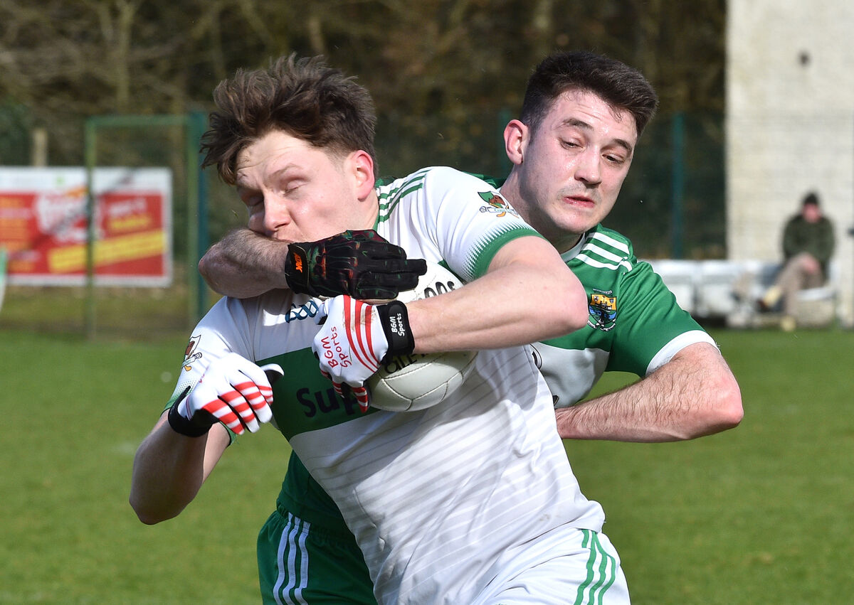  Eolan O'Leary, Macroom, getting in a tackle on Ryan Walsh, Kanturk. Picture: Dan Linehan
