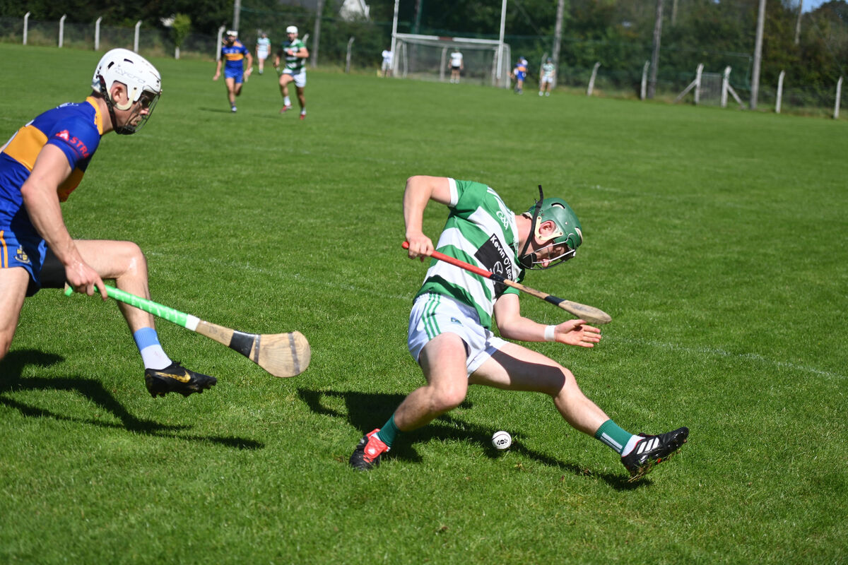 Colm Butler, Valley Rovers, loses his footing under pressure from Carrigaline's David Griffin at Ballygarvan last year. Picture: Larry Cummins Colm Butler, Valley Rovers, loses his footing under pressure from Carrigaline's David Griffin at Ballygarvan last year. Picture: Larry Cummins