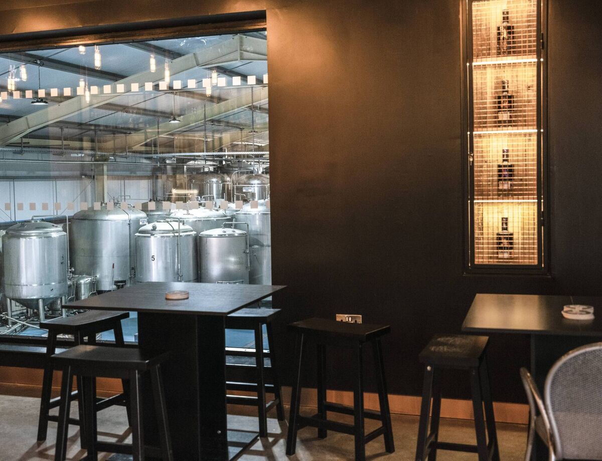 The bar, which looks over the brewery and distillery. The bar, which looks over the brewery and distillery.