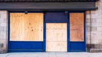Boarded up shop
