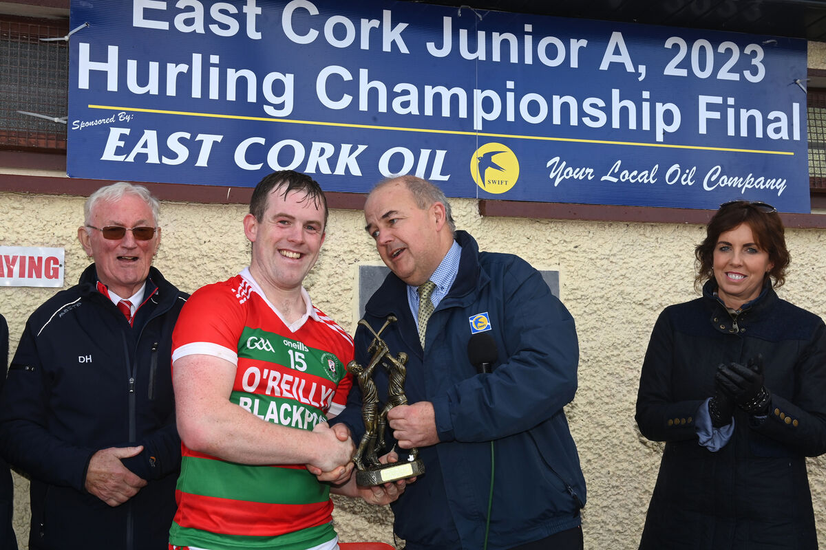 THE EAST CORK OIL Man of the Match was James Forde of Carraig na bhFear (Carrignavar) presented with the trophy by Con Ryan, East Cork Oil with (left) Don Hegarty, East Cork Board and (right) Avril Geary, Secretary East Cork Board after they beat St Ita's in the East Cork Oil-sponsored East Cork Junior A Hurling Championship final: St Ita’s v Carraig na bhFear, at Rathcormac. Pic Larry Cummins THE EAST CORK OIL Man of the Match was James Forde of Carraig na bhFear (Carrignavar) presented with the trophy by Con Ryan, East Cork Oil with (left) Don Hegarty, East Cork Board and (right) Avril Geary, Secretary East Cork Board after they beat St Ita's in the East Cork Oil-sponsored East Cork Junior A Hurling Championship final: St Ita’s v Carraig na bhFear, at Rathcormac. Pic Larry Cummins