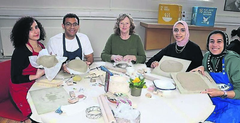 Left to right, Soukaina Mourissi,from Morocco, with Waleed Gazia Egypt, Madeline Winters Cork, Esraa Wael Egypt, and Dina Fakhry also from Egypt at the Empty Bowls Peace project for Gaza. Photo: Mary P O Connor.