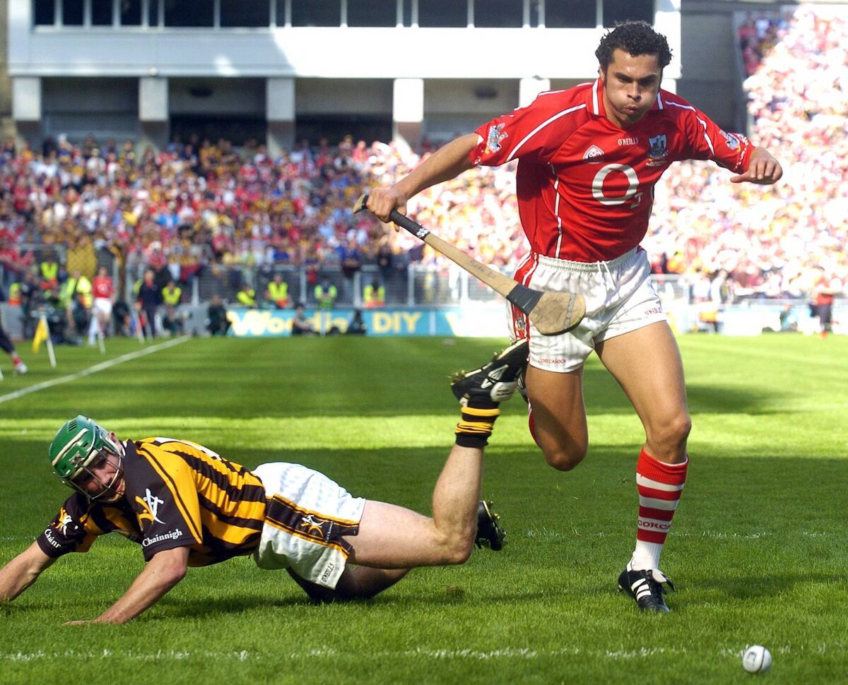 Seán Óg racing onto the ball past Kilkenny corner forward Eddie Brennan. Picture: Denis Minihane. Seán Óg racing onto the ball past Kilkenny corner forward Eddie Brennan. Picture: Denis Minihane.