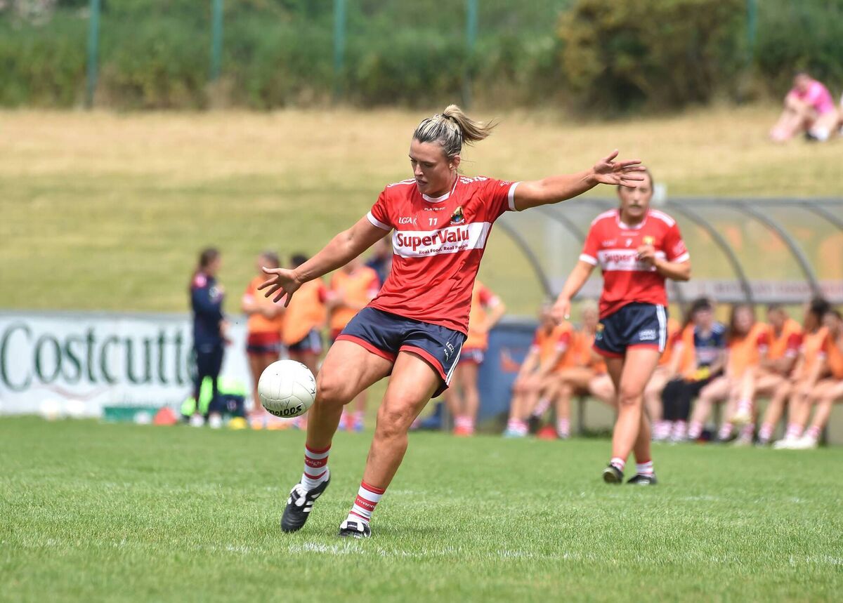 Doireann O'Sullivan kicking a point against Kerry. Doireann O'Sullivan kicking a point against Kerry.