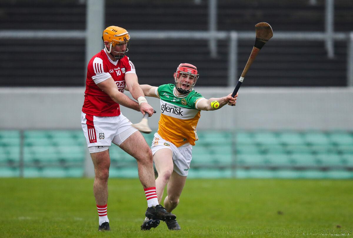 Cork's Declan Dalton tries to get his shot away despite the attention of Offaly's Charlie Mitchell. Picture: Inpho/Leah Scholes