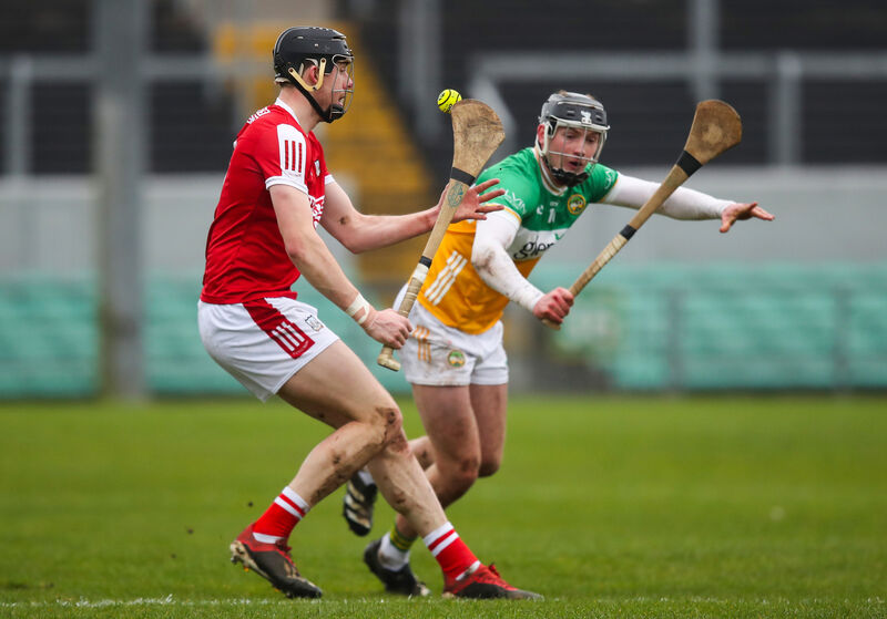 Cork’s Robert Downey with Dan Ravenhill of Offaly in last weekend's league game. Picture: INPHO/Leah Scholes