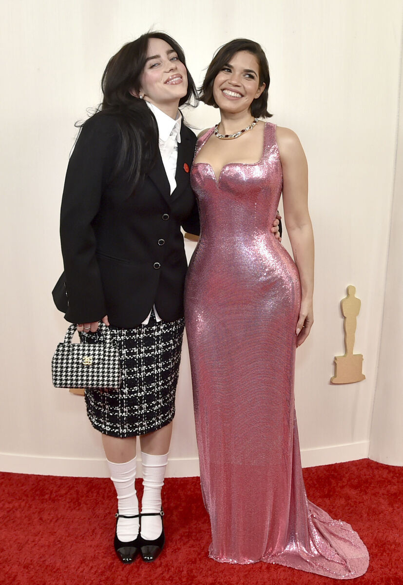 Billie Eilish, left, and America Ferrera arrive at the Oscars. (Photo by Richard Shotwell/Invision/AP) Billie Eilish, left, and America Ferrera arrive at the Oscars. (Photo by Richard Shotwell/Invision/AP)