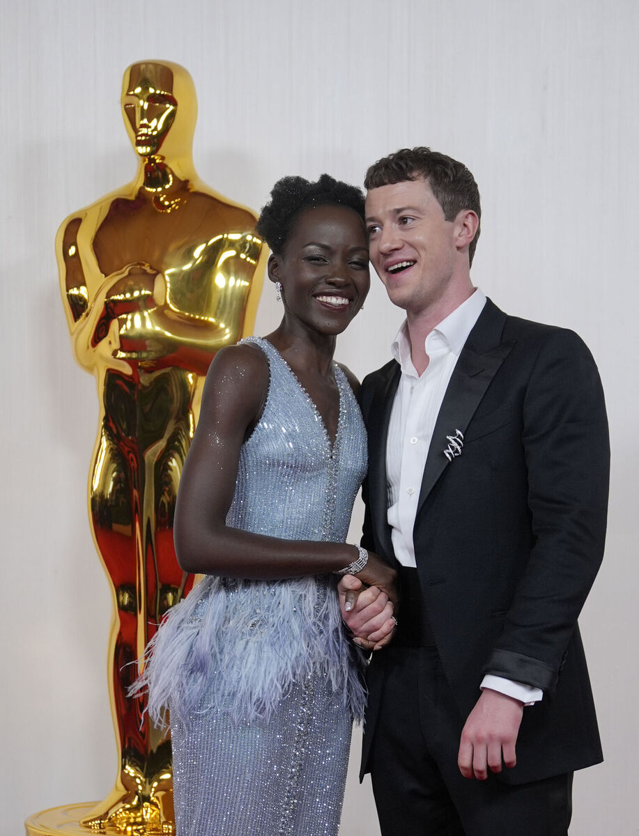 Lupita Nyong'o, left, and Joseph Quinn arrive at the Oscars. (AP Photo/Ashley Landis) Lupita Nyong'o, left, and Joseph Quinn arrive at the Oscars. (AP Photo/Ashley Landis)