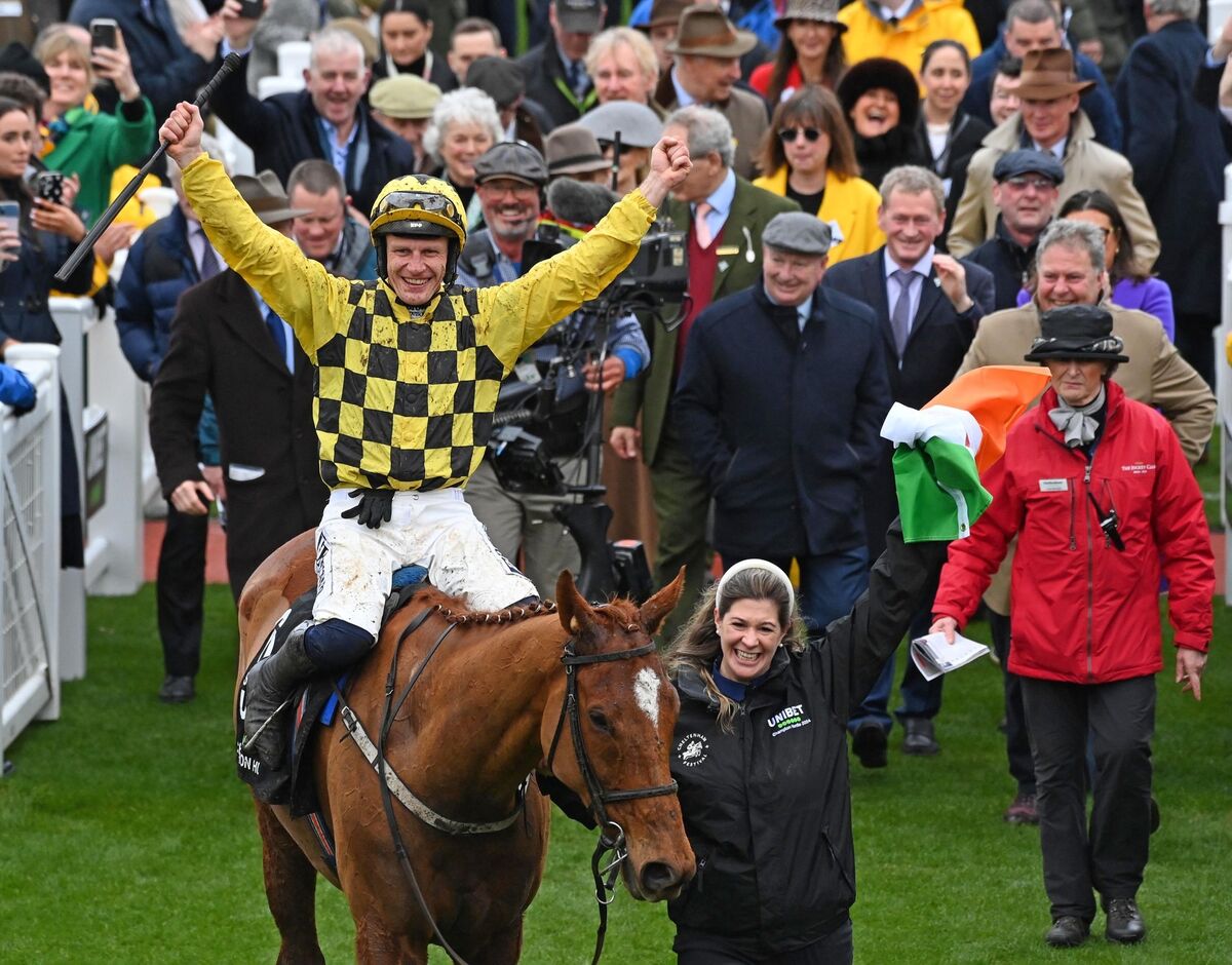 State Man and Paul Townend with groom Rachel Robins after winning the Unibet Champion Hurdle Challenge Trophy (Grade 1).